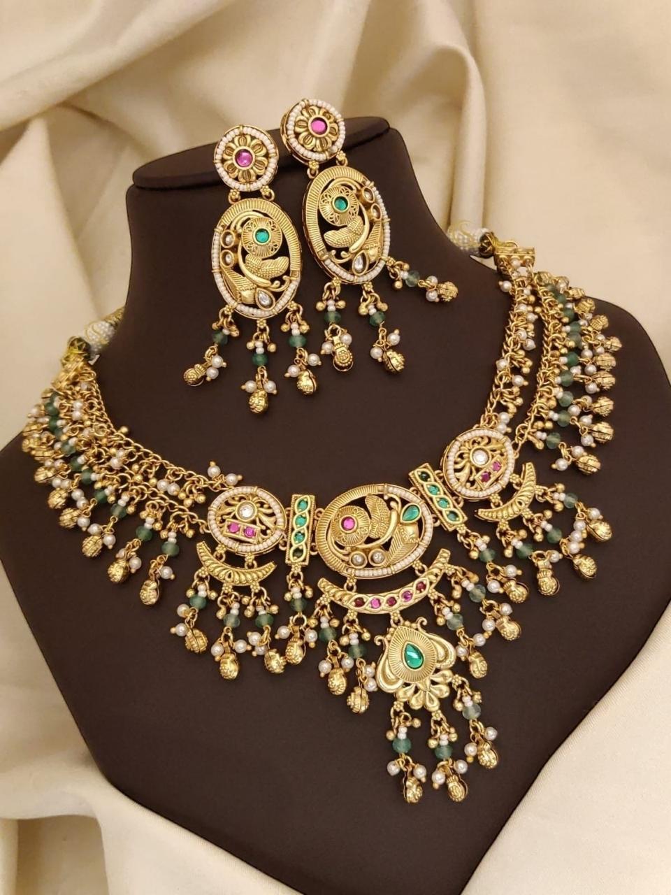 Antique Gold Peacock Motif Necklace Set with Green & Pink Stones