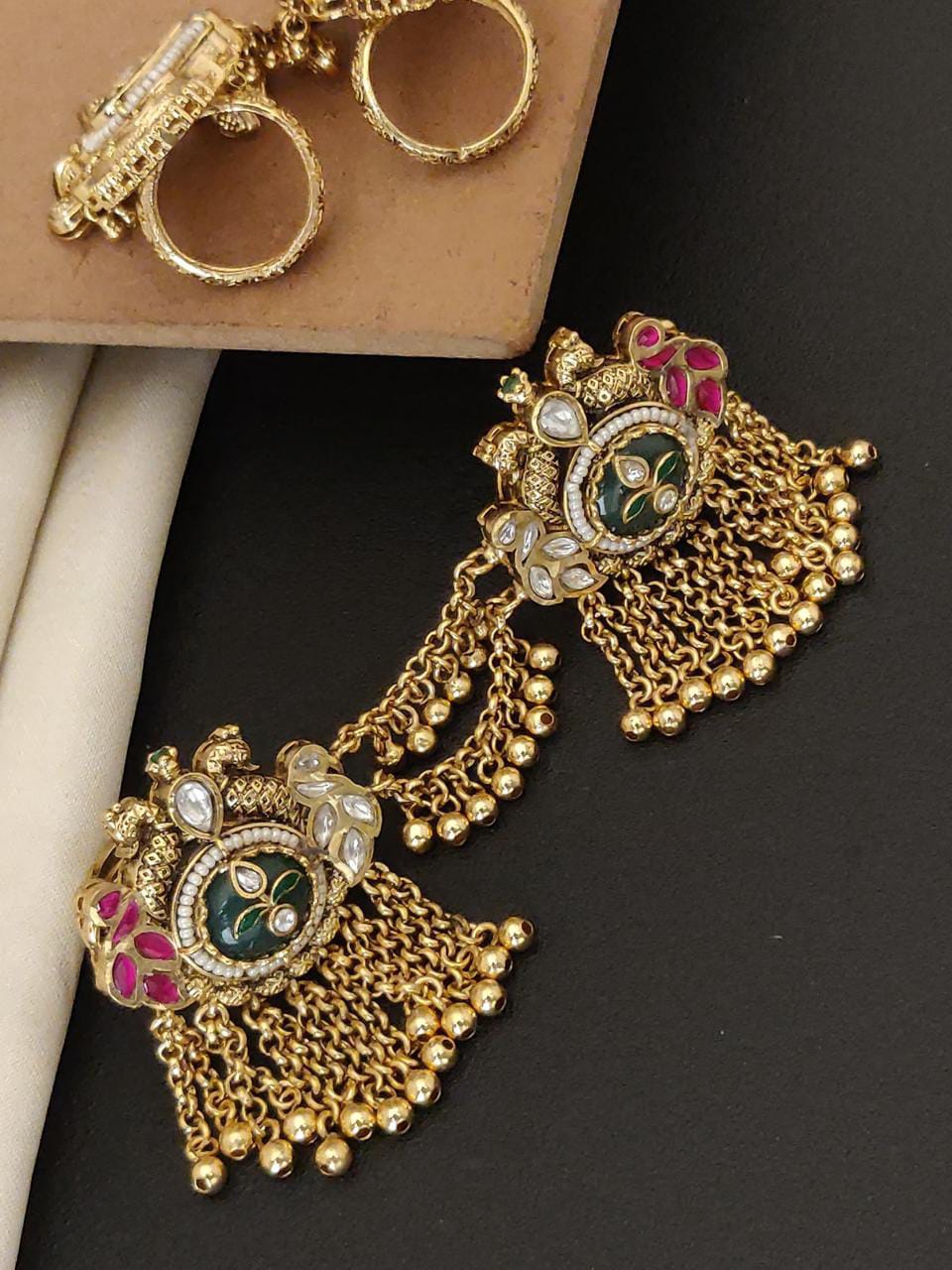 Traditional Gold-Plated Kundan Chain Jhumka Earrings with Green & Pink Stones