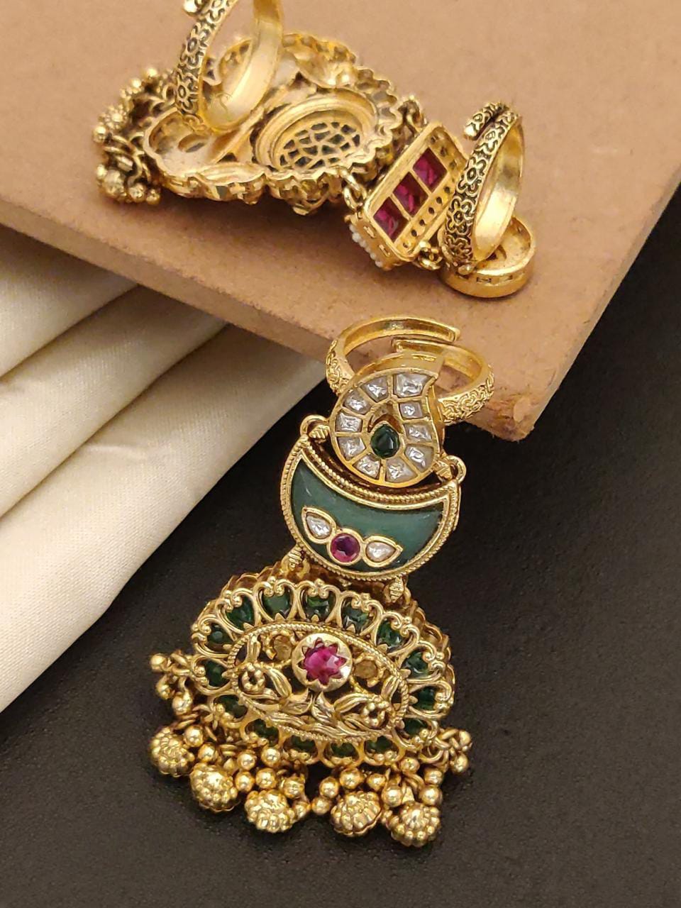 Antique Gold Finish Kundan Jhumka Earrings with Green Enamel & Ruby Stone