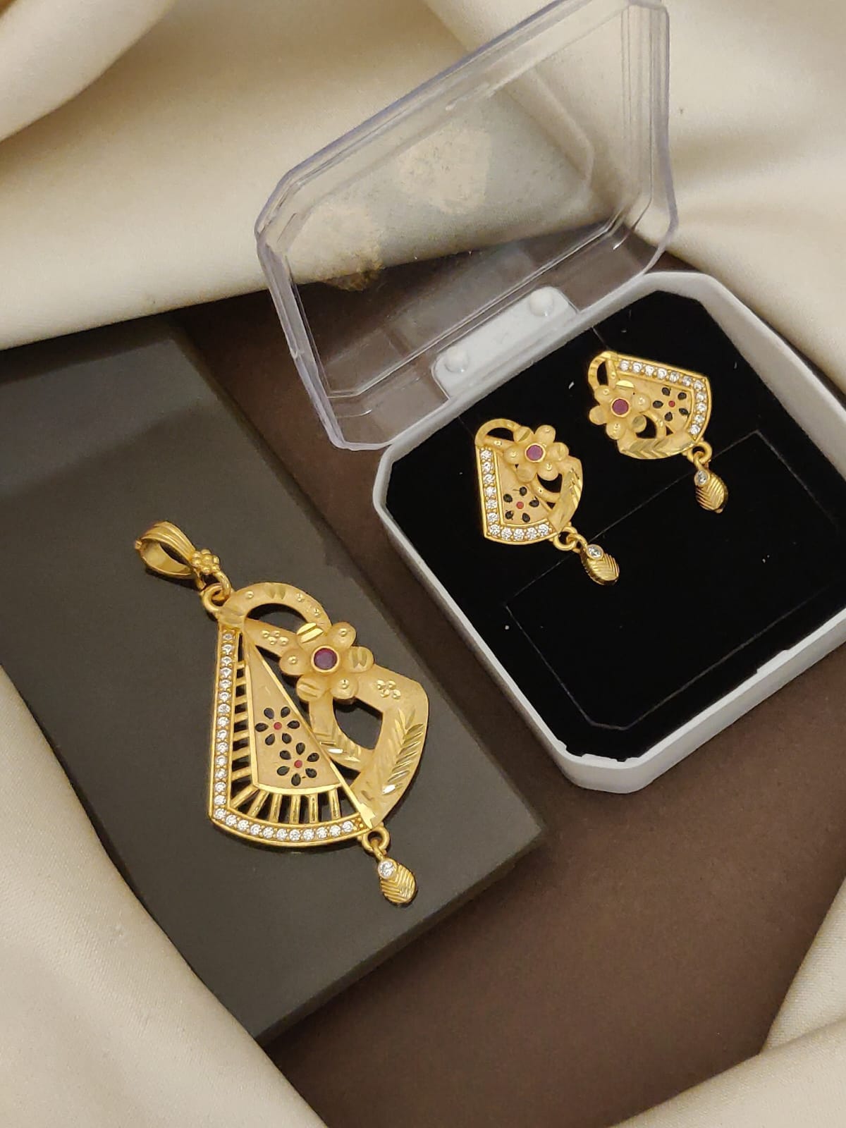 Elegant Gold-Tone Pendant & Earring Set with Stone Detailing
